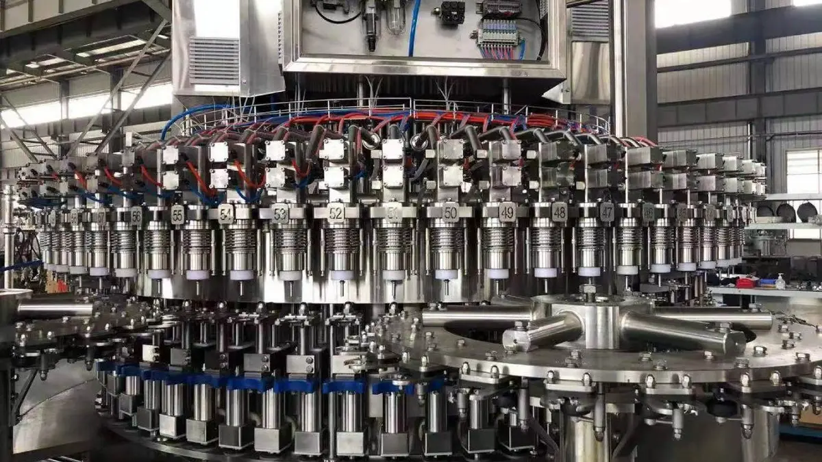 Industrial liquid filling machine with multiple filling nozzles and complex piping system.