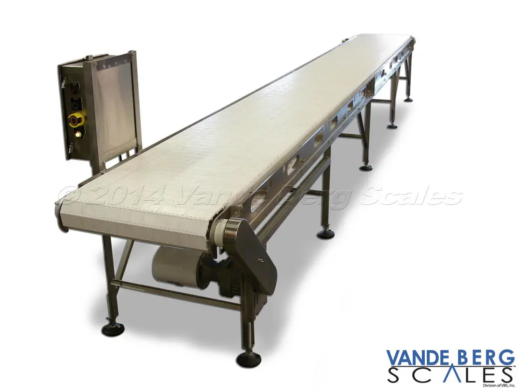 Stainless steel conveyor belt with open frame, adjustable legs, drive motor, and side-mounted control panel.