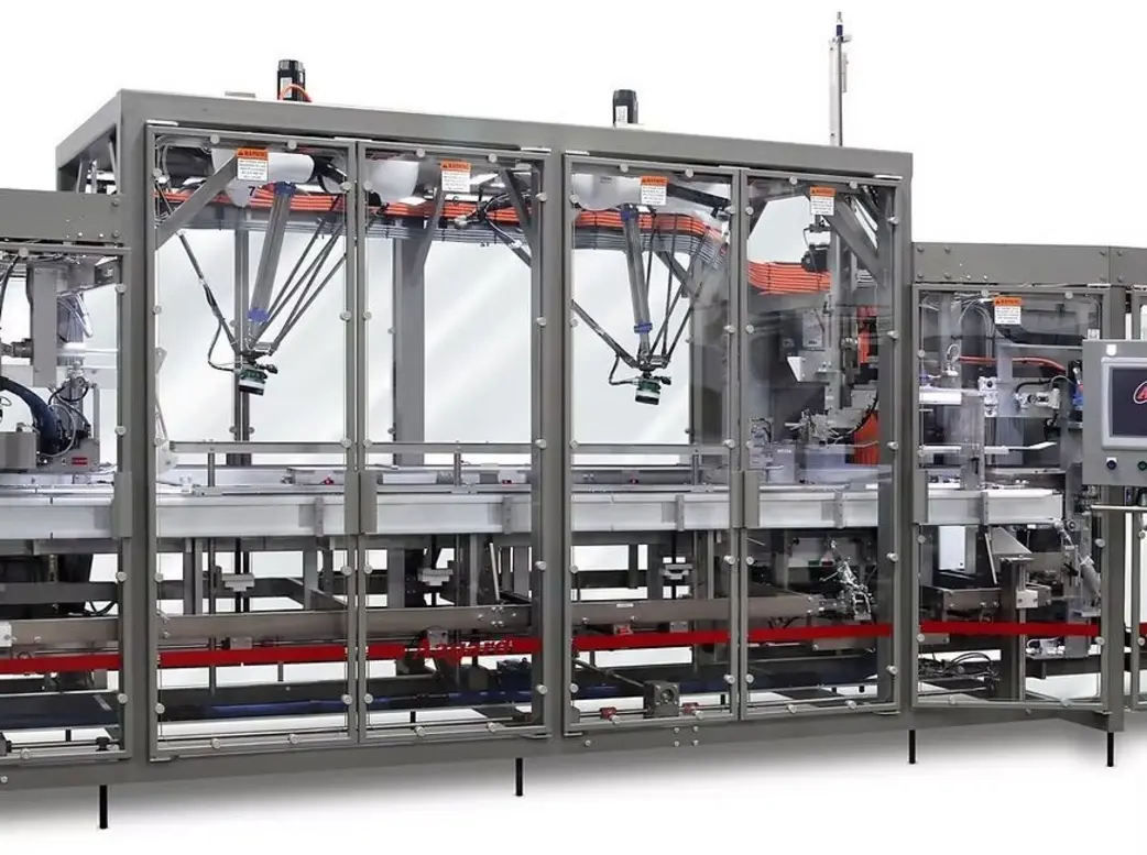 Automated case packing system with multiple robotic arms and transparent enclosure.