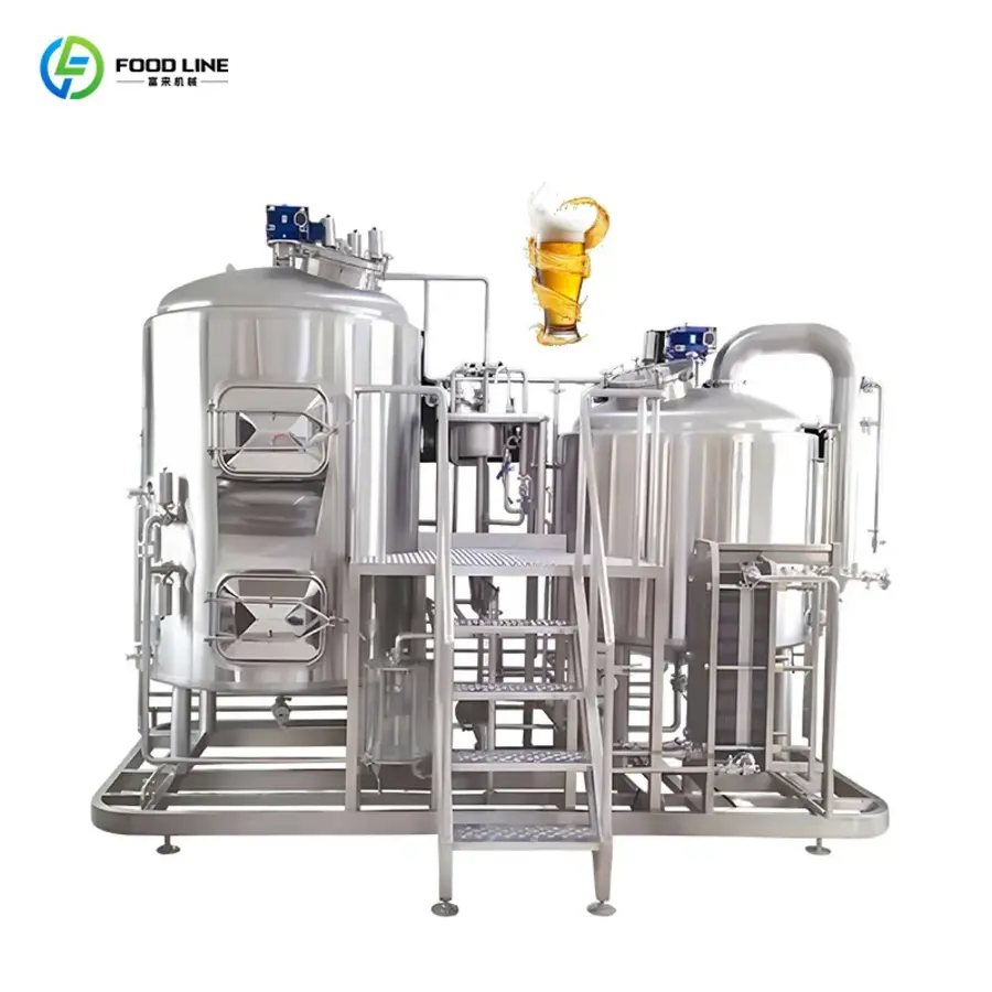 Stainless steel brewing equipment with tanks and staircase for beverage production.