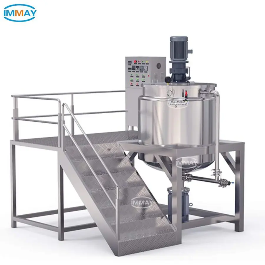 Stainless steel processing vessel with top-mounted motor, control panel, discharge piping, and access stairs.