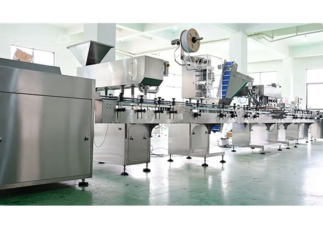 Automated food filling machine line with conveyors and packaging stations in a factory setting.