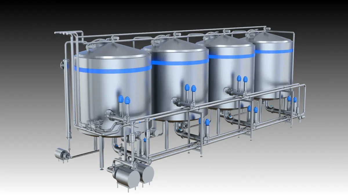 Four stainless steel tanks with pipes and valves in an industrial setup.