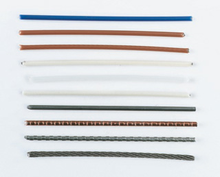 Food conveyor belt showing a mechanical fastener splice and a smooth endless splice for comparison