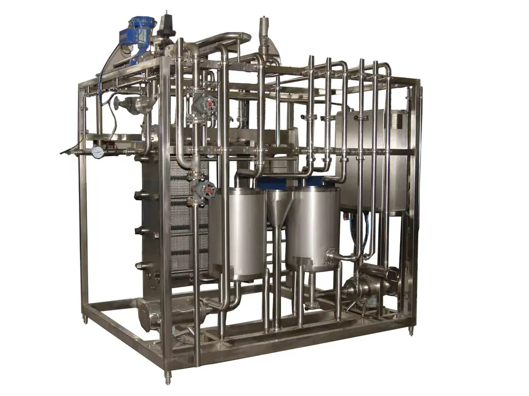 Continuous pasteurization equipment featuring stainless steel tanks and interconnected pipes.