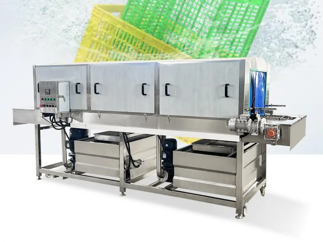Industrial stainless steel washing machine with enclosed compartments, conveyor, control panel, and collection tanks.