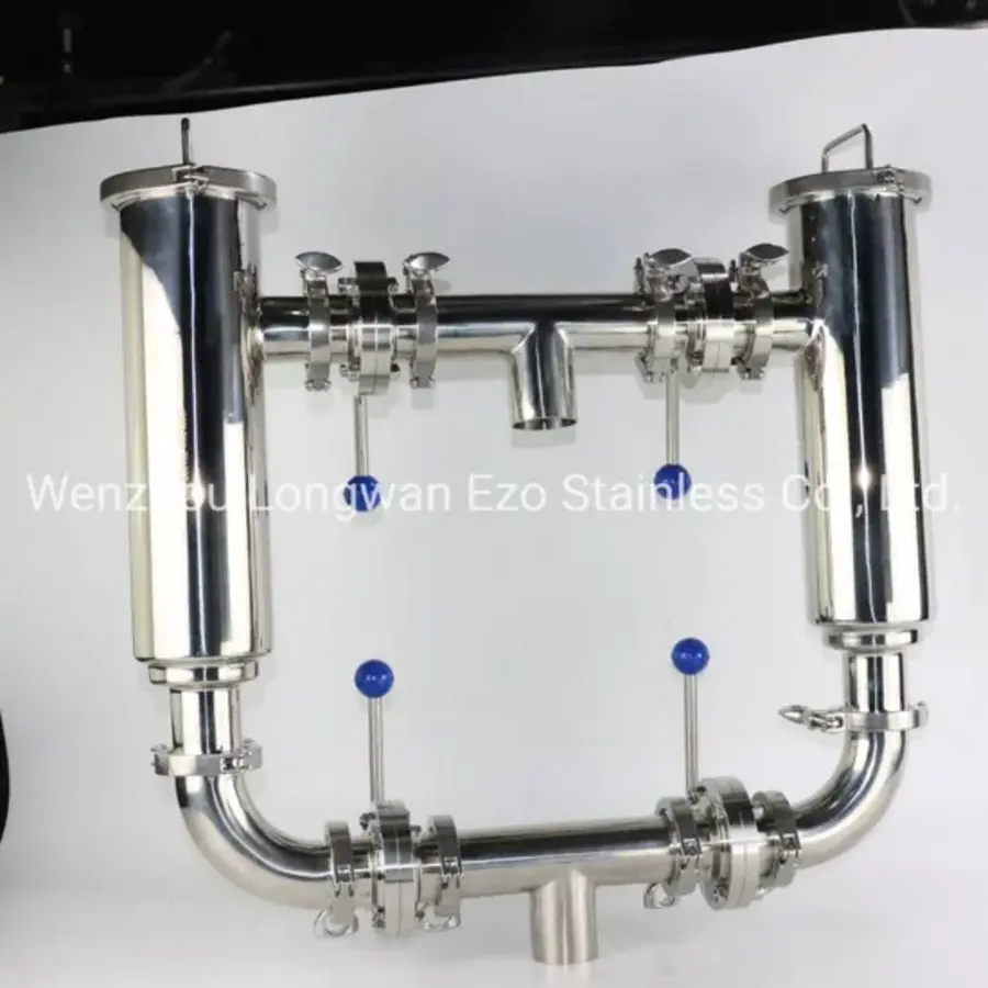 Stainless steel piping assembly with valves and fittings for food processing applications.